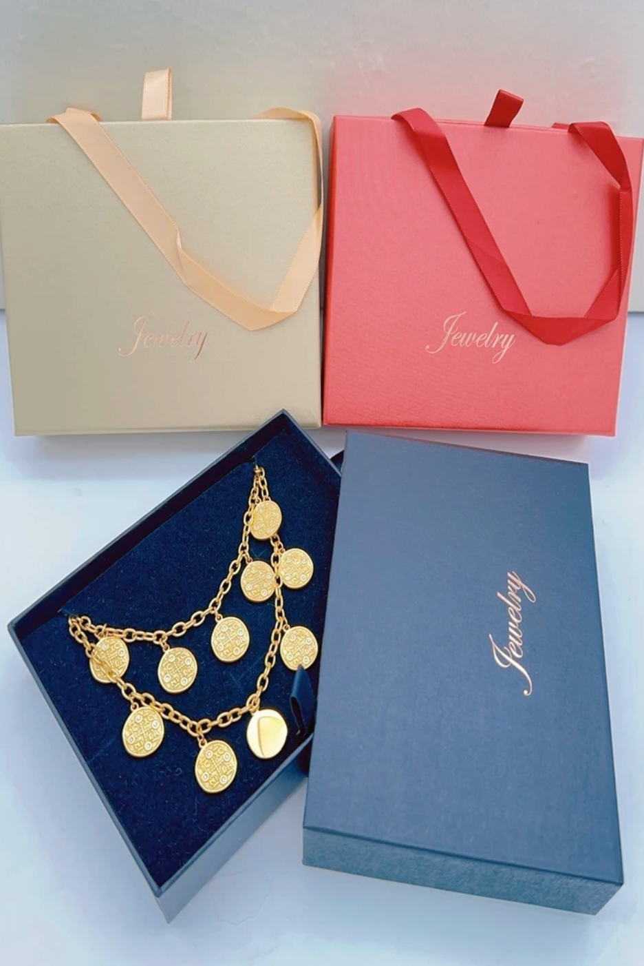 Coffret bijoux en acier inoxydable avec pendentif rond strass