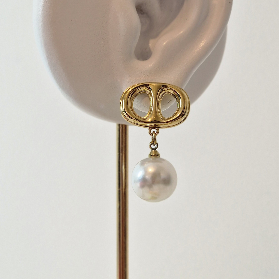 Boucles d'oreilles en acier inoxydable avec perle blanche