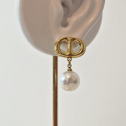 Boucles d'oreilles en acier inoxydable avec perle blanche