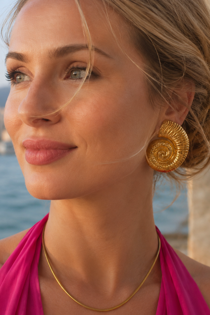grandes boucles d'oreilles coquillage dorées
