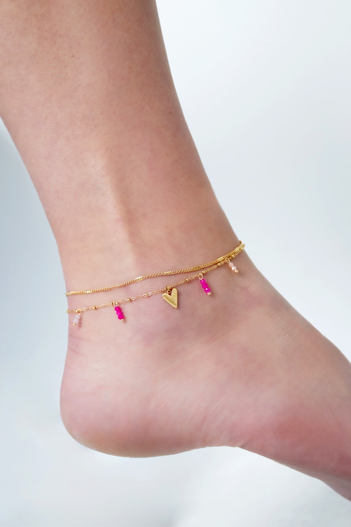 Bracelet de cheville double amour doré – Bijou tendance pour l’été