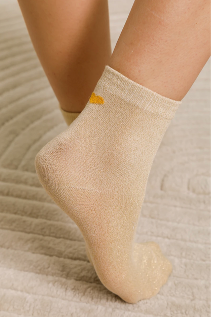 Chaussettes irisées femme – noires ou dorées, confortables et brillantes