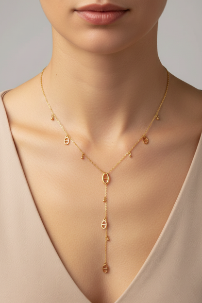Collier Y doré en acier inoxydable « Cascade d’Ovales » – chaîne délicate & pendentifs raffinés