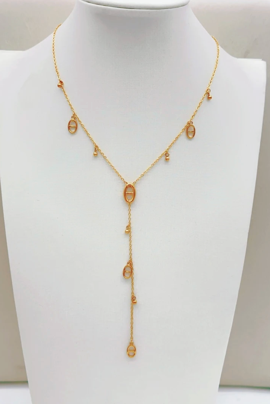 Collier Y doré en acier inoxydable « Cascade d’Ovales » – chaîne délicate & pendentifs raffinés