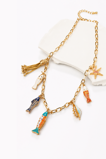 Collier doré et charms marins