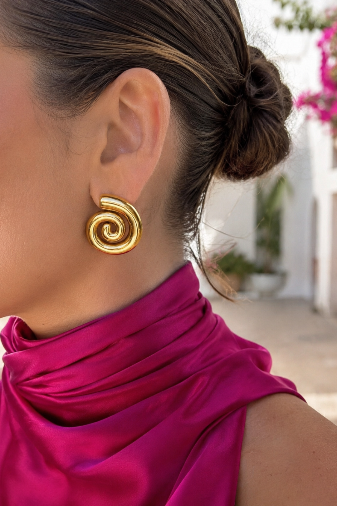 boucles d'oreilles design sculptural dorées en acier inoxydable pour femme