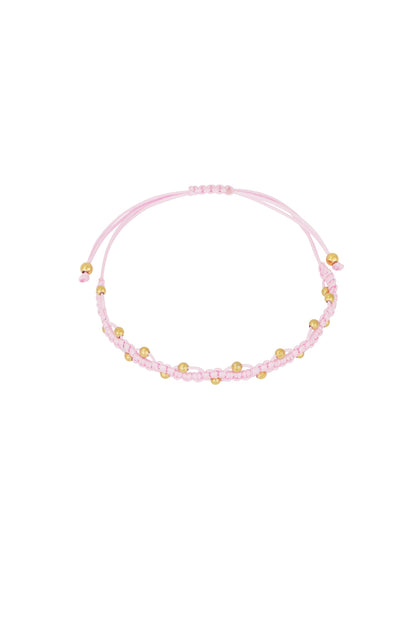 Bracelet cordon rose pâle perles dorées ajustable